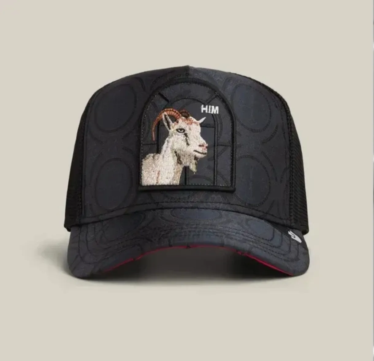 Gorra trucker negra con parche bordado de cabra 'HIM'